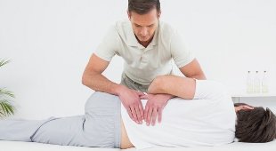 the back pain in the lumbar region massage
