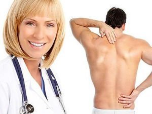 A doctor treats back pain